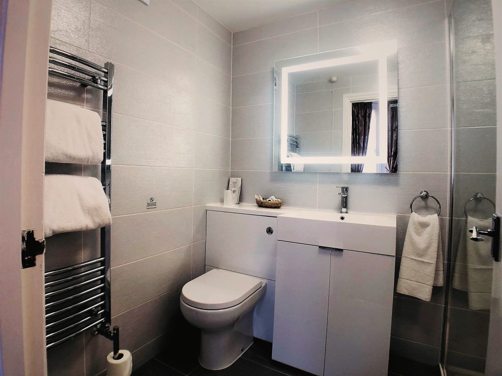 Modern en-suite with heated towel rail