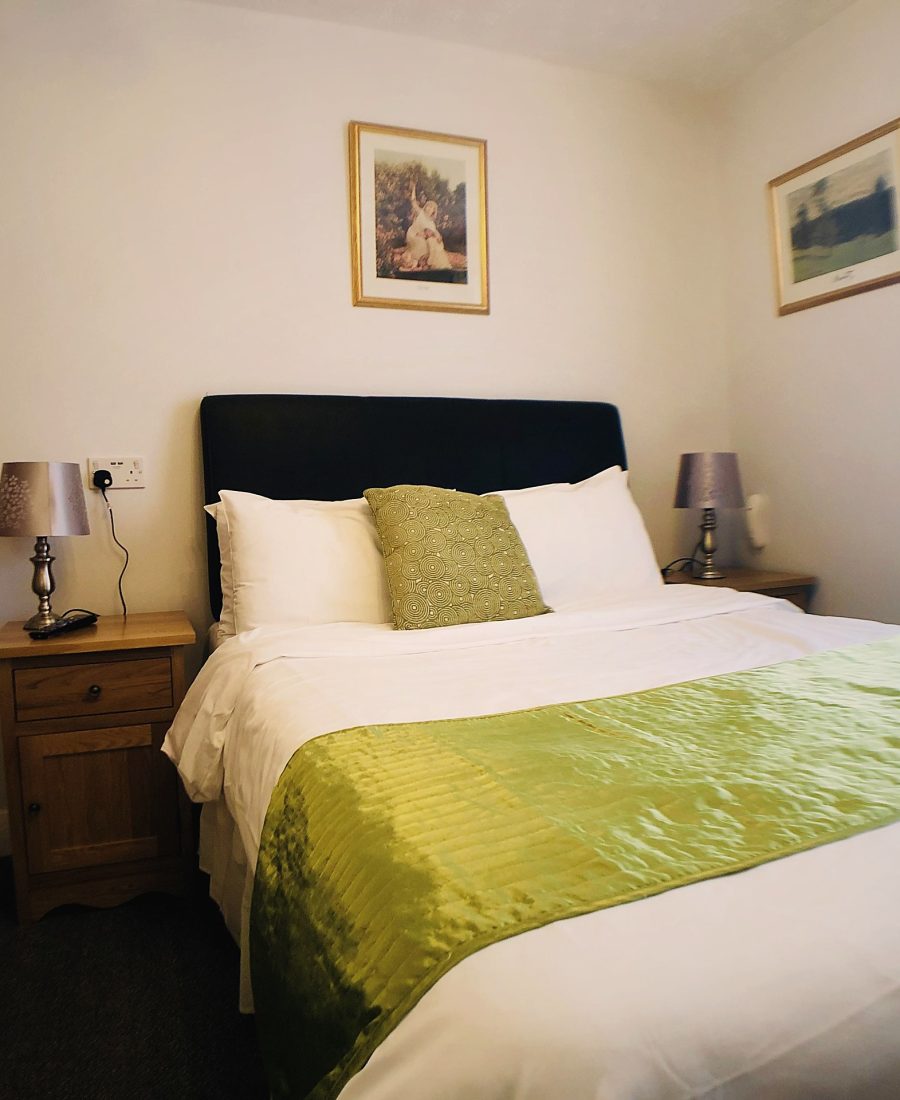 Double room with sage bed runner